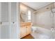 Clean bathroom with tub, shower, and updated vanity at 1416 Wood Lake Cir, St Cloud, FL 34772