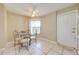 Small dining area with glass-top table and four chairs at 1416 Wood Lake Cir, St Cloud, FL 34772