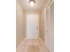 Bright entryway with tile floors and built-in storage at 1416 Wood Lake Cir, St Cloud, FL 34772
