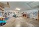 Large garage with workshop area and ample storage at 1416 Wood Lake Cir, St Cloud, FL 34772
