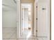 Hallway with access to bathroom and other rooms at 1416 Wood Lake Cir, St Cloud, FL 34772