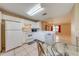 Kitchen with white appliances and a breakfast nook at 1416 Wood Lake Cir, St Cloud, FL 34772