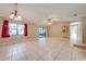 Bright and airy living room with tile floors and lots of natural light at 1416 Wood Lake Cir, St Cloud, FL 34772