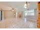 Spacious living area with tile floors, high ceilings and open floor plan at 1416 Wood Lake Cir, St Cloud, FL 34772