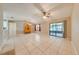 Open living room with tile floors and ceiling fan at 1416 Wood Lake Cir, St Cloud, FL 34772