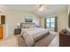 Main bedroom with stylish decor and large window at 1416 Wood Lake Cir, St Cloud, FL 34772