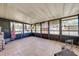 Spacious screened porch with tiled floor, perfect for relaxing outdoors at 1416 Wood Lake Cir, St Cloud, FL 34772