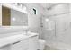 Modern bathroom with marble tile, floating vanity and glass shower at 18802 Robertson St, Orlando, FL 32833