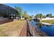 Expansive wooden dock offers scenic canal access at 201 Edgewater Dr, Saint Cloud, FL 34769