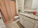 Clean bathroom with granite countertops and shower/tub combo at 2672 Harmonia Hammock Rd, Harmony, FL 34773