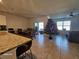 Open concept kitchen with island and view of living room at 2672 Harmonia Hammock Rd, Harmony, FL 34773