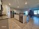 Spacious kitchen with island and stainless steel appliances at 2672 Harmonia Hammock Rd, Harmony, FL 34773