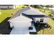 Single-story house with a two-car garage and a large front yard at 326 Dinner Lake Ct, Lake Wales, FL 33859