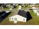 Aerial view of house and neighborhood at 326 Dinner Lake Ct, Lake Wales, FL 33859