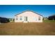 House exterior view, with backyard at 326 Dinner Lake Ct, Lake Wales, FL 33859