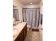 Clean bathroom with double vanity and shower/tub combo at 326 Dinner Lake Ct, Lake Wales, FL 33859
