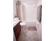 Clean bathroom with shower/tub combo and granite countertop at 326 Dinner Lake Ct, Lake Wales, FL 33859