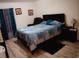 Bright bedroom with a comfortable bed and ample floor space at 326 Dinner Lake Ct, Lake Wales, FL 33859