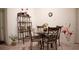 Small dining area with glass-top table and four chairs at 326 Dinner Lake Ct, Lake Wales, FL 33859