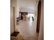 Open floor plan with kitchen, breakfast bar, and living area at 326 Dinner Lake Ct, Lake Wales, FL 33859