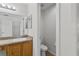 Small bathroom with toilet and sink at 3362 Winchester Estates Cir, Lakeland, FL 33810