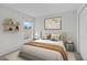 Bedroom with queen bed and stylish decor at 3362 Winchester Estates Cir, Lakeland, FL 33810