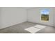 Bright bedroom featuring neutral walls and carpet flooring at 3362 Winchester Estates Cir, Lakeland, FL 33810