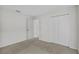 Bright bedroom with carpet flooring and double-door closet at 3362 Winchester Estates Cir, Lakeland, FL 33810