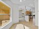 Sunlit dining area with tile floor and view into living room at 3362 Winchester Estates Cir, Lakeland, FL 33810