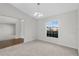 Simple dining room with carpeted floors and a large window at 3362 Winchester Estates Cir, Lakeland, FL 33810