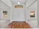 Bright entryway with double doors and hardwood flooring at 3362 Winchester Estates Cir, Lakeland, FL 33810