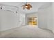 Spacious living room with sliding glass doors at 3362 Winchester Estates Cir, Lakeland, FL 33810