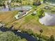 Aerial view of waterfront property with expansive land and lake views at 3415 Lake Diane Rd, Tavares, FL 32778