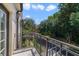 Balcony overlooking a tree-lined street with great views at 701 Westpark Way # 202, Celebration, FL 34747
