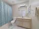 Bathroom with tub, shower, and vanity at 701 Westpark Way # 202, Celebration, FL 34747