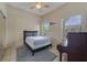 Bedroom with a full-size bed and a piano at 701 Westpark Way # 202, Celebration, FL 34747