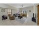 Relaxing living room with tiled floors, comfortable seating, and a TV at 701 Westpark Way # 202, Celebration, FL 34747