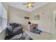 Home office with desk, chair, and large window at 701 Westpark Way # 202, Celebration, FL 34747