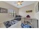 Home office with desk, chair, and large window at 701 Westpark Way # 202, Celebration, FL 34747