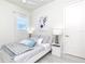 Cozy bedroom with a queen bed and a built-in closet at 803 E 11Th Ave, New Smyrna Beach, FL 32169