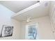 Bright home office features a loft, ceiling fan, and large window at 803 E 11Th Ave, New Smyrna Beach, FL 32169