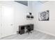 Home office with built-in shelving, desk, and wood-look floors at 803 E 11Th Ave, New Smyrna Beach, FL 32169