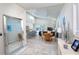 Open concept living space with kitchen, dining, and living area at 803 E 11Th Ave, New Smyrna Beach, FL 32169