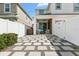 Patio area with a stone paved walkway at 8610 Tallfield Ave, Orlando, FL 32832