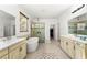 Luxurious bathroom with soaking tub, double vanity, and walk-in shower at 9111 Outlook Rock Trl, Windermere, FL 34786