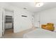 Bedroom with built-in shelving and light wood flooring at 9111 Outlook Rock Trl, Windermere, FL 34786