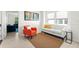 Living room with comfy seating and large windows at 9111 Outlook Rock Trl, Windermere, FL 34786
