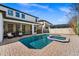 Large pool and spa with screened-in patio and backyard at 9111 Outlook Rock Trl, Windermere, FL 34786