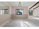 Bright dining room with large windows and neutral walls at 1042 E Myers Blvd, Mascotte, FL 34753