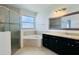 Main bathroom with corner soaking tub and walk-in shower at 12276 Alder Branch Loop, Orlando, FL 32824